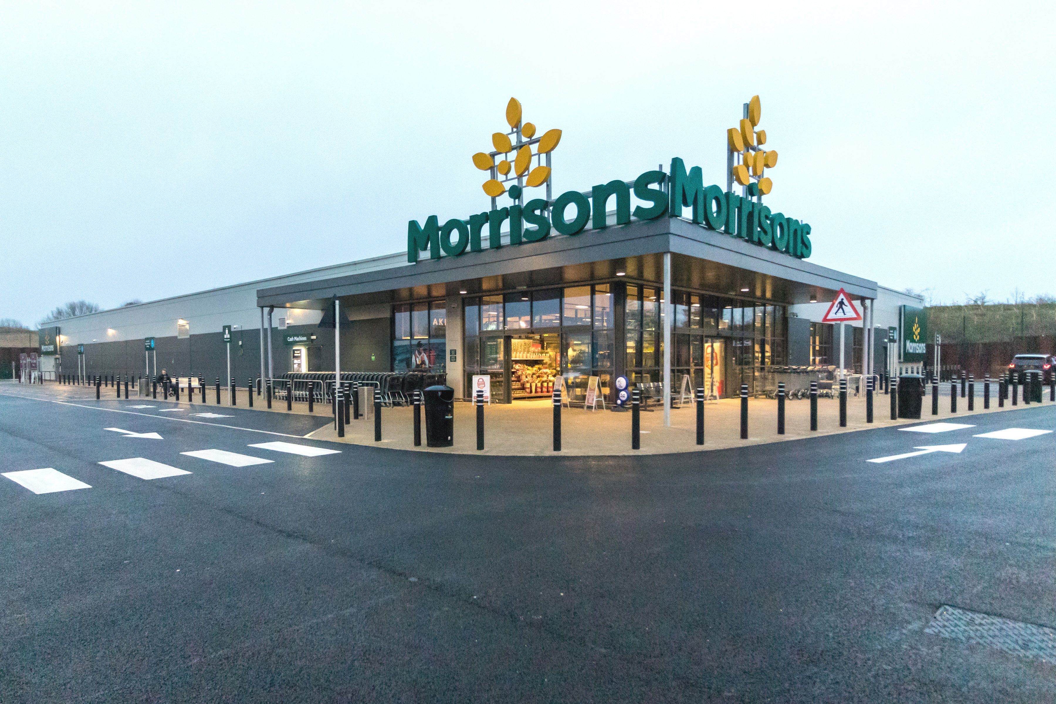 Exterior view of Hormann's Supermarket in London, England, showcasing the store's signage and entrance